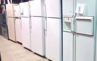 refrigerators along a wall