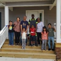 Chris with the Najeeb Family, future neighbors